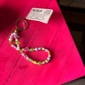 Colorful Beaded Bracelet with Smiley Charm